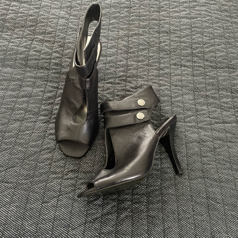 Fergie Black Leather Heels with Double Snap Closure